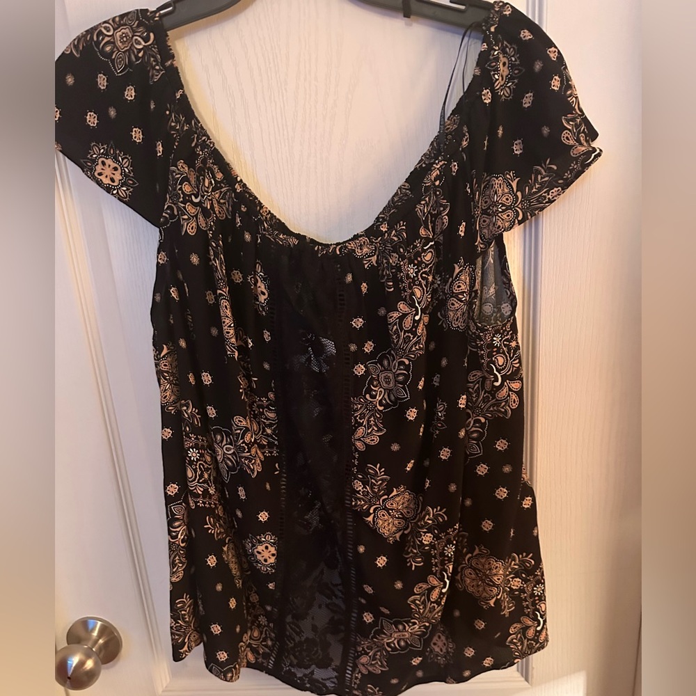 Ladies blouse has opening in back